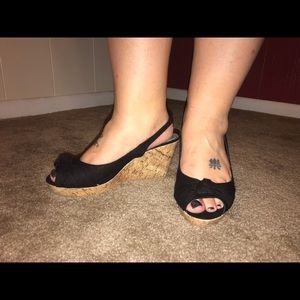 Sling back black wedges